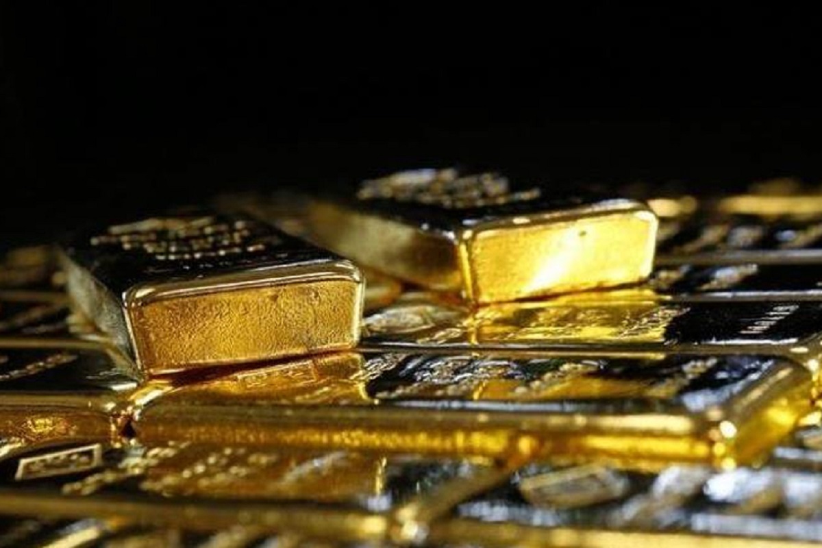 Gold dips as US dollar claws up, equities firm