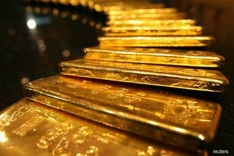 Gold hits over 4-mth high as dollar index slumps to 3-yr lows