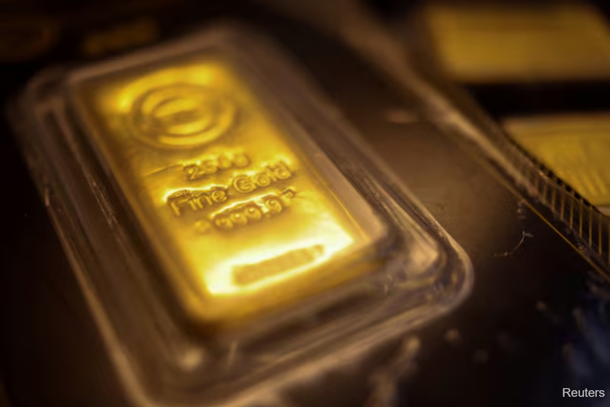 Gold holds steady amid Middle East tensions, US economic data in focus