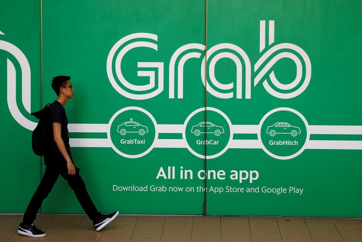 Grab's 3Q net loss widens to US$988m on non-cash expenses, revenue down 9%