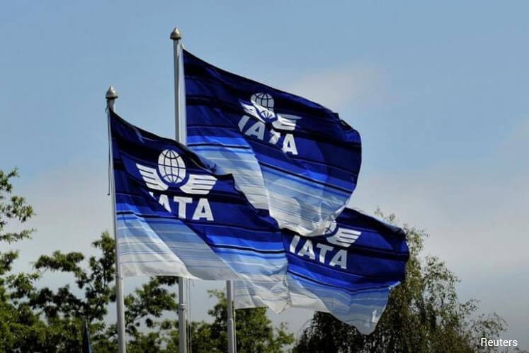 Global airlines slash yearly profit forecast on worries over protectionism