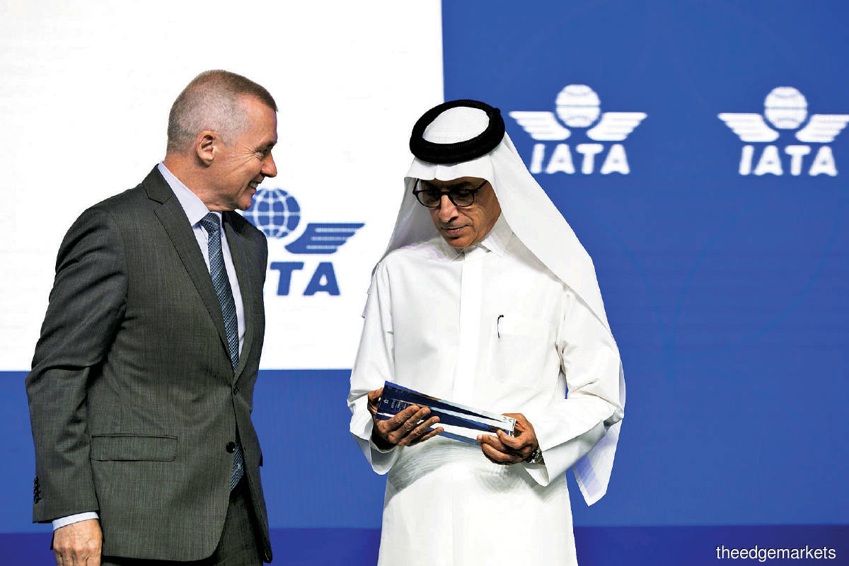 ‘Nobody expected millions of people would be made redundant and millions of people would be allowed to work from home when passengers need people to serve them,’ said Akbar (right) in Doha. With him is IATA director-general Willie Walsh. (Photo by IATA)