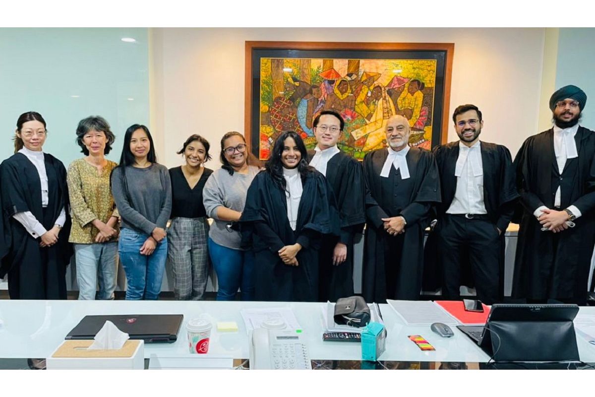 Gurdial (third from right) with Andran (second left) and Au (fourth left) and some of the affected mothers (Photo provided by the lawyers involved in the case)