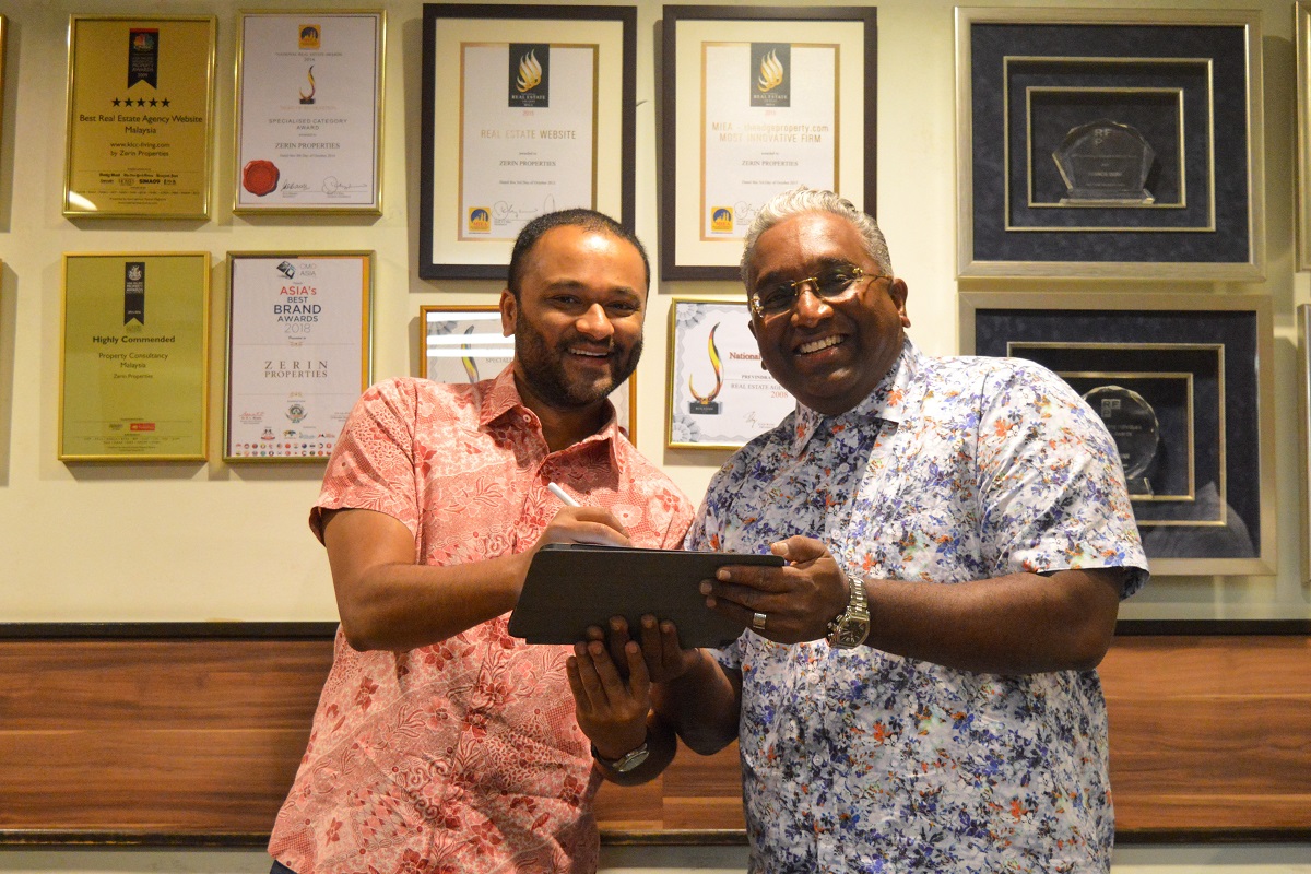 Rohen (left) and Previndran signing the partnership agreement with the GRESB electronically. (Photo courtesy of Zerin Habitat)
