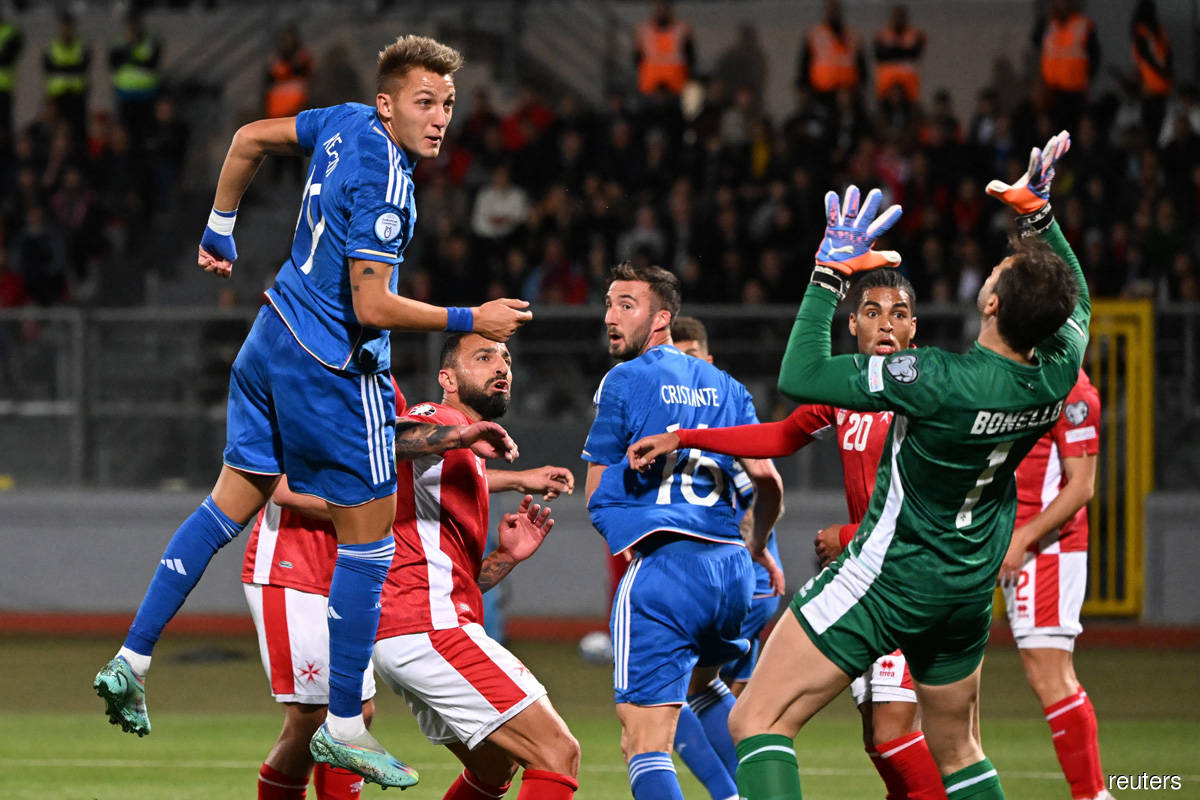 Italy back on track with 2-0 win over Malta
