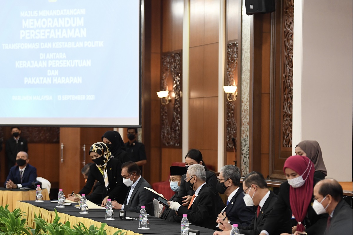 Putrajaya, PH ink landmark 'Political Transformation and Stability' MoU, but details scarce