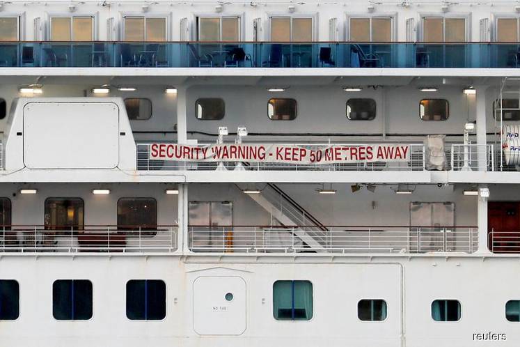 British passengers from virus-hit cruise ship arrive home
