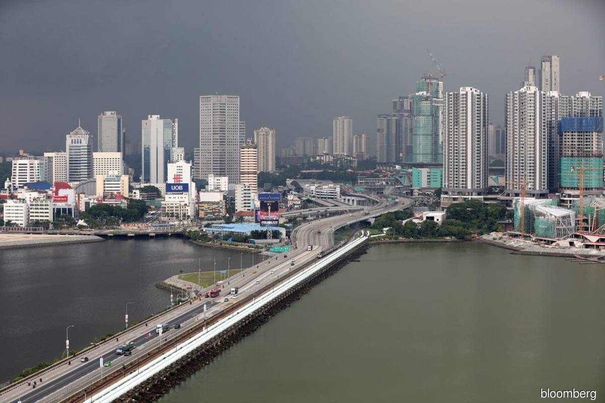 The city of Johor Bahru, Malaysia and the Johor-Singapore causeway, as seen from Singapore (Bloomberg filepix)