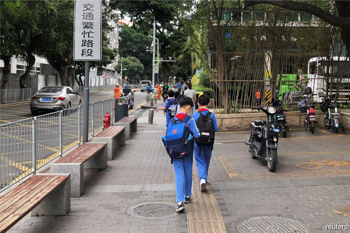 Children leave a school in Shekou area of Shenzhen, Guangdong province, China.