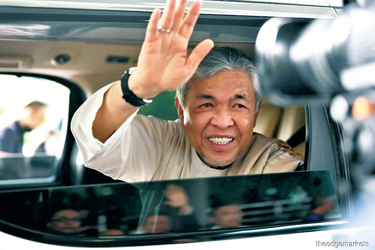 Zahid leaving the court after his acquittal on all 40 graft charges under Section 16 (A) (B) of the Malaysian  Anti-Corruption Commission Act and Section 165 of the Penal Code (Photo by Suhaimi Yusuf/The Edge)