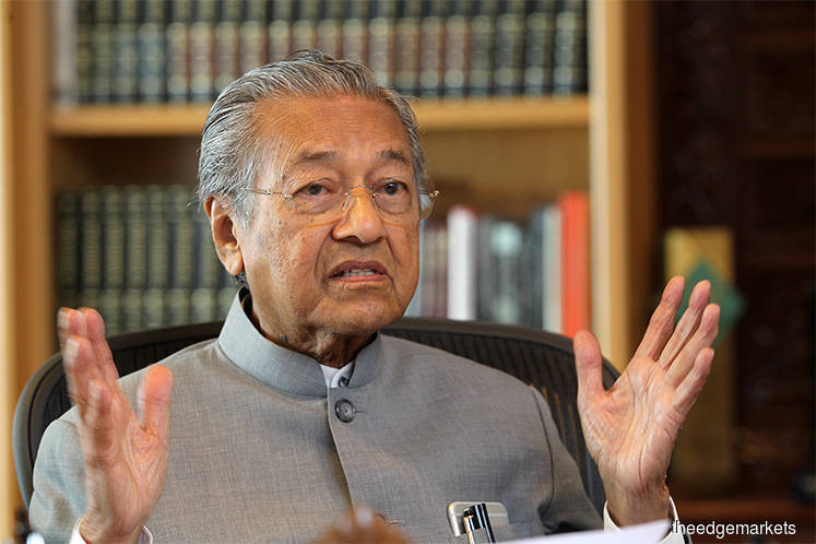 Election over, new Malaysia PM gets down to business