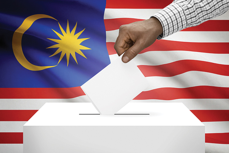Malaysia's opposition cries foul over uneven playing field in election