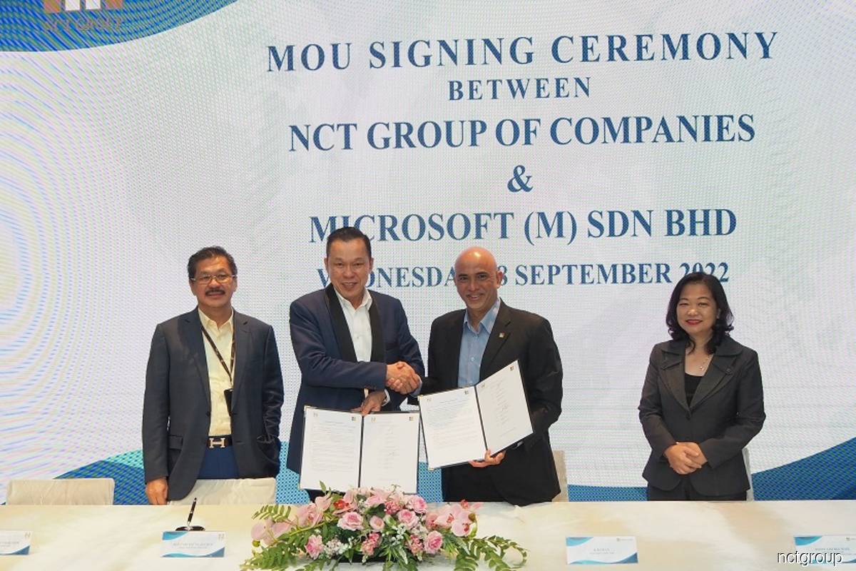 [From left to right] Datuk Yap Fook Choy, Group Executive Director of NCT Group; Datuk Sri Yap Ngan Choy, K Raman, and Datin Lim Bee Wah, General Manager of Small, Medium and Corporate Group of Microsoft Malaysia, during the signing ceremony.