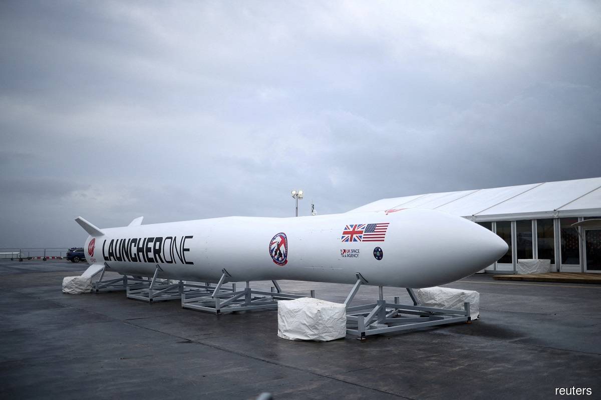 A replica model of Virgin Orbit's LauncherOne rocket sits in a media area ahead of UK's First launch at Newquay Airport in Newquay, Britain, Jan 8, 2023.