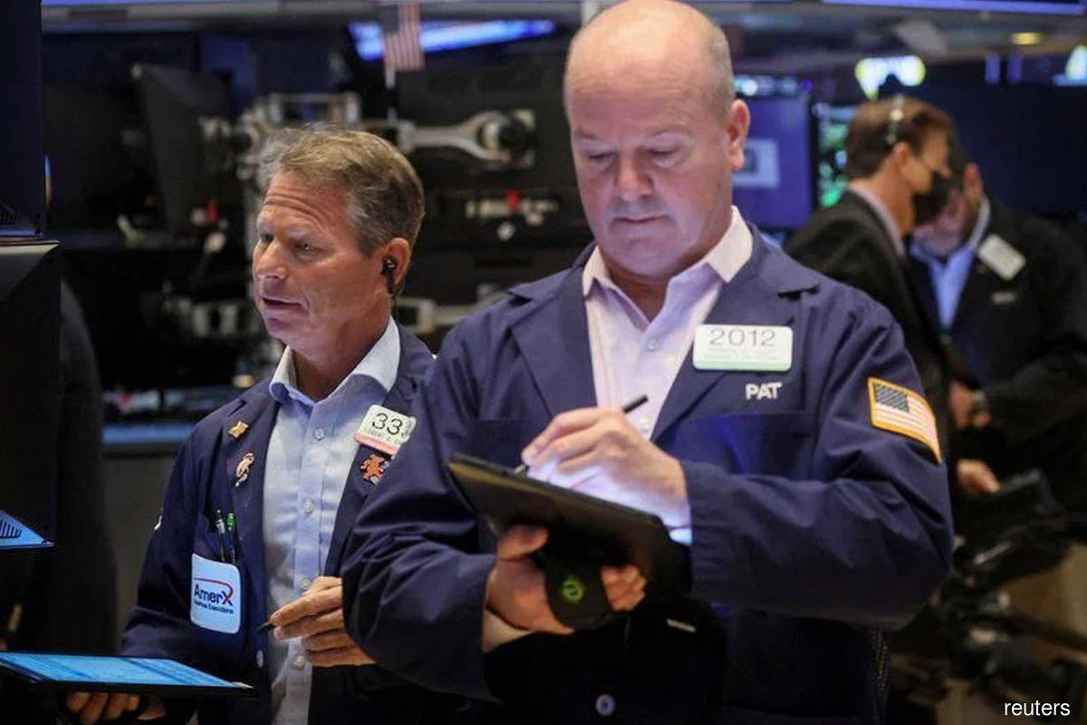Wall Street whipsaws, S&P closes lower on worries of prolonged inflation