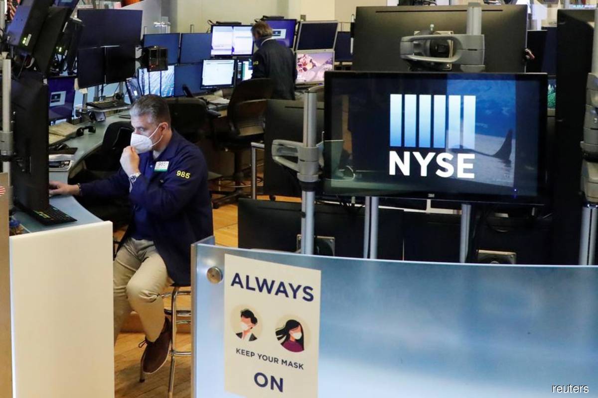 Dow hits 30,000 on vaccine progress, Biden transition
