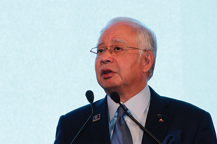 AMMB and AmIslamic seek to strike out Najib's suit