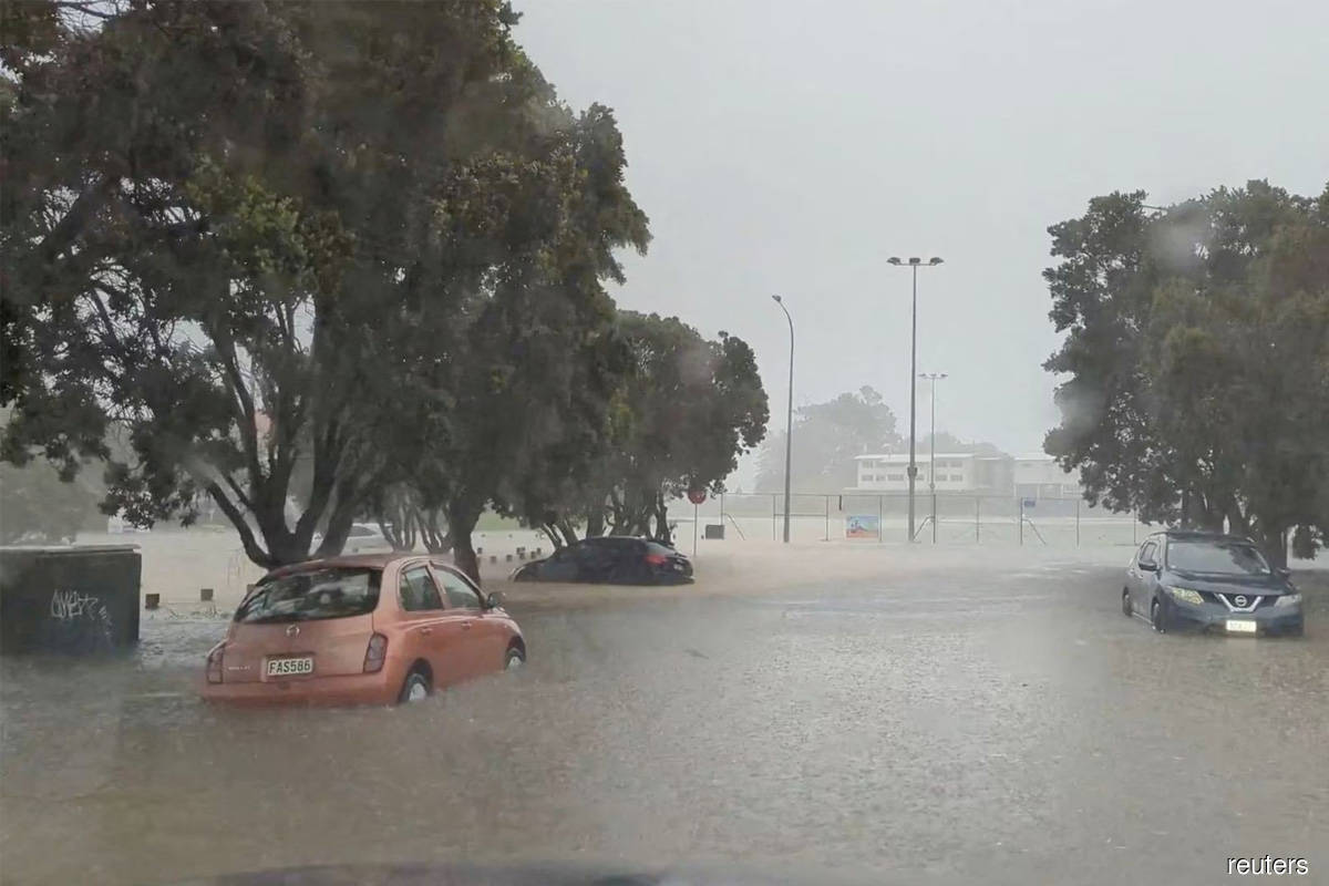 New Zealand's Auckland hit by more rain as roads and homes flooded