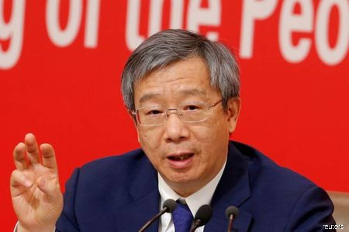 Governor of People's Bank of China (PBOC) Yi Gang attends a news conference on China's economic development ahead of the 70th anniversary of its founding, in Beijing, China on Sept 24, 2019. (Photo by Florence Lo/Reuters filepix)