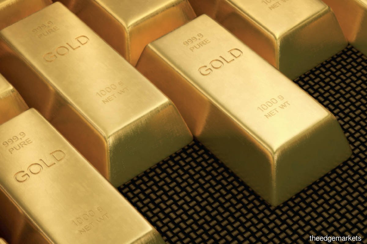 Gold dips as stronger dollar, yields dent appeal