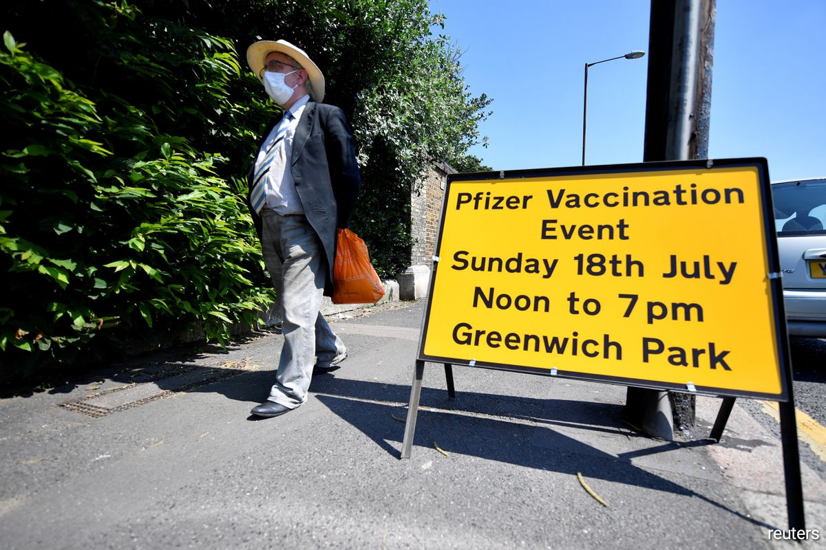 Imperial College London researchers said people who reported receiving two vaccine doses were half as likely to test positive for COVID-19, adjusting for other factors such as age, whether or not the people tested had COVID-19 symptoms.