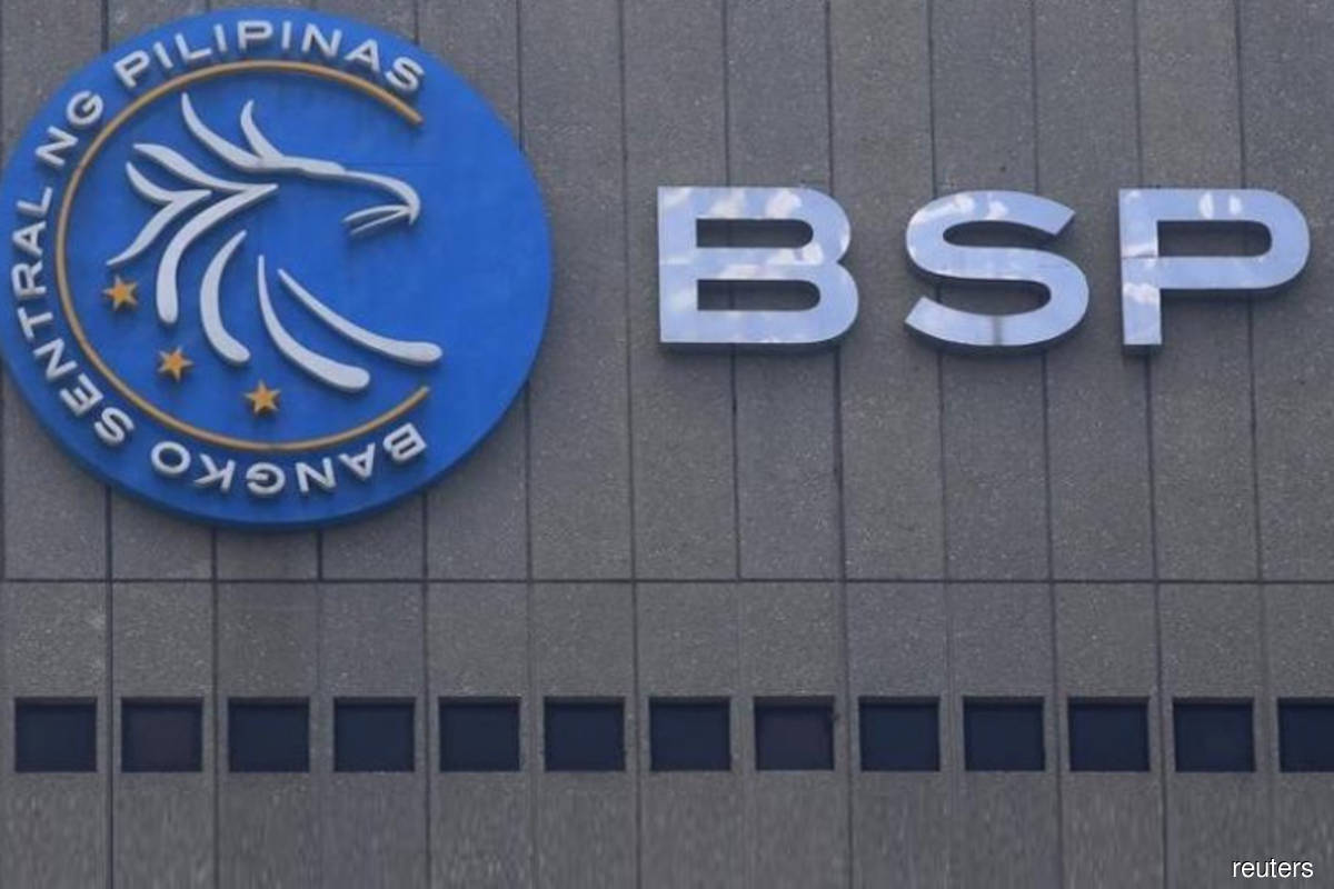 Philippines raises key rate on inflation risks, peso slump