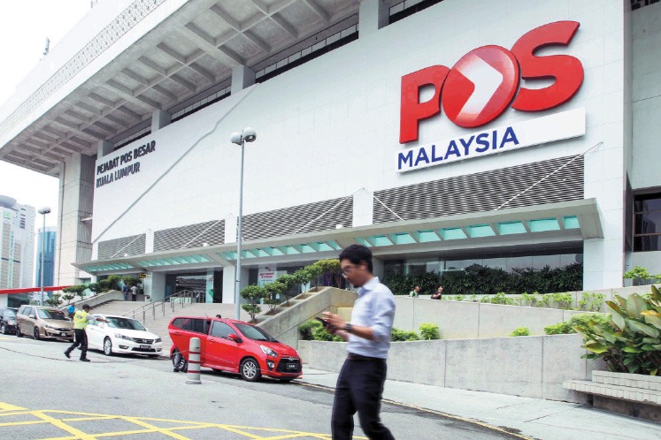 Pos Malaysia rises as much as 10% on new postage rates ...