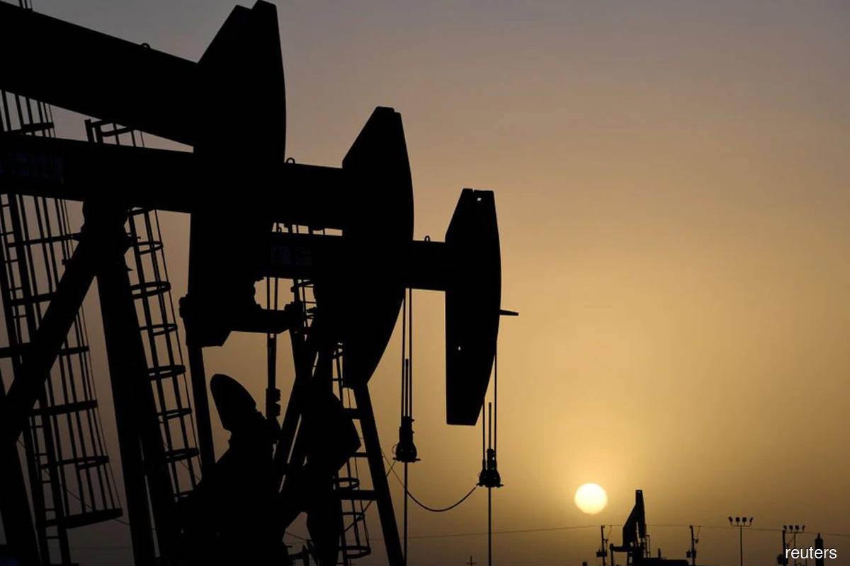 Oil prices slip on OPEC cut in demand forecast, China COVID cases