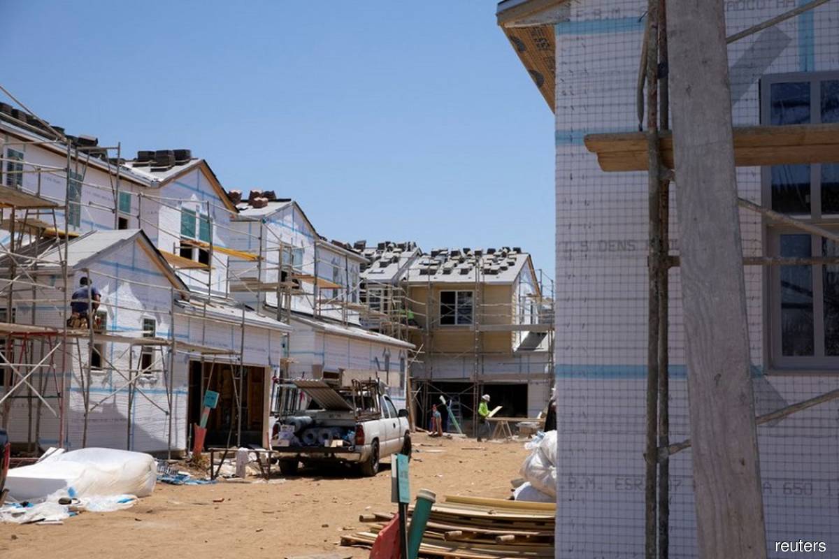 US housing market cooling as building permits tumble, starts fall