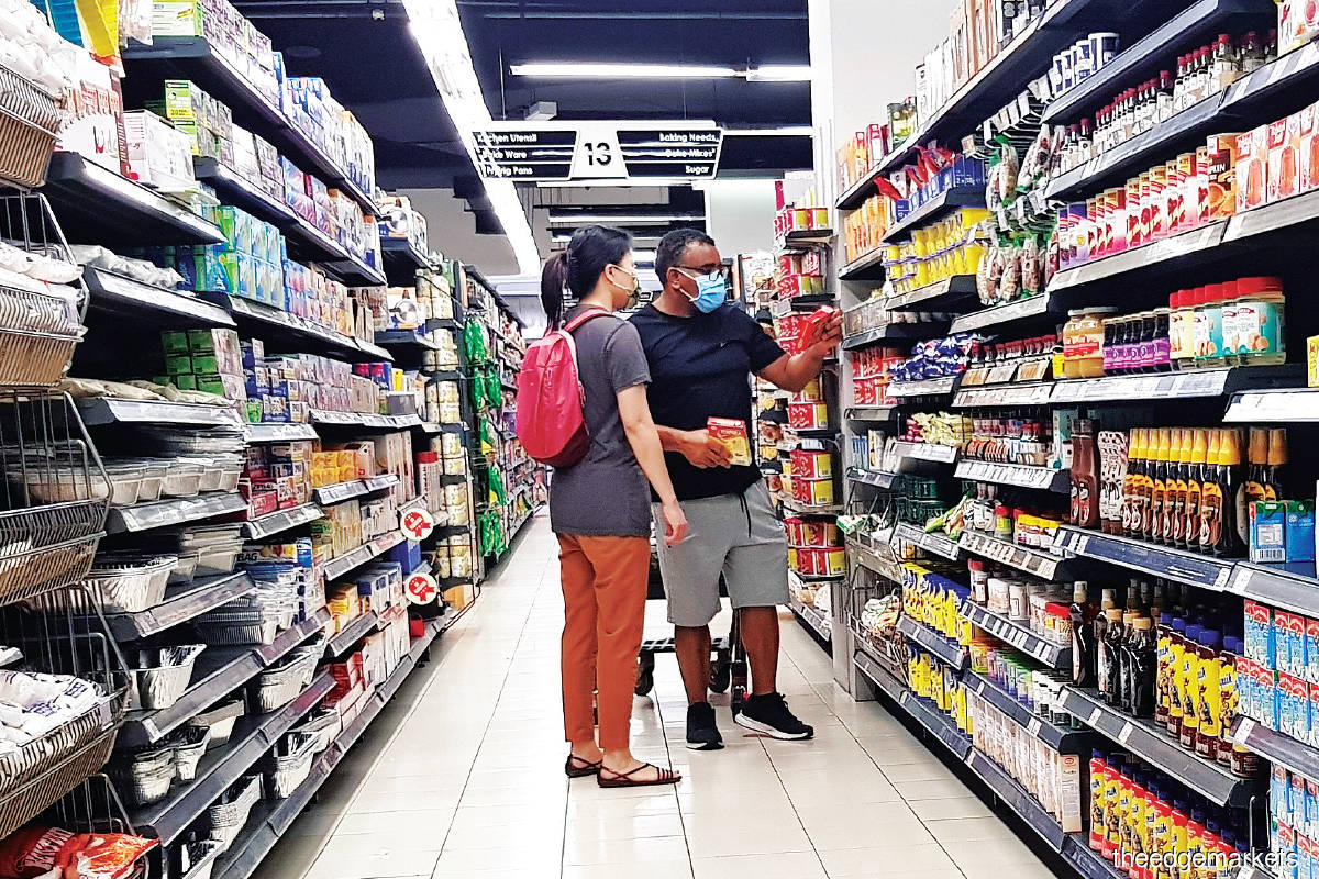 Many retailers are maintaing their prices for now but they are expected to increase prices gradually, and perhaps quietly, in the near future  (Photo by Suhaimi Yusuf/The Edge)