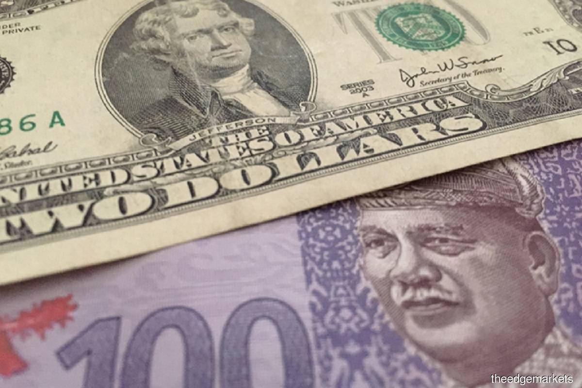 Ringgit opens slightly higher against US dollar