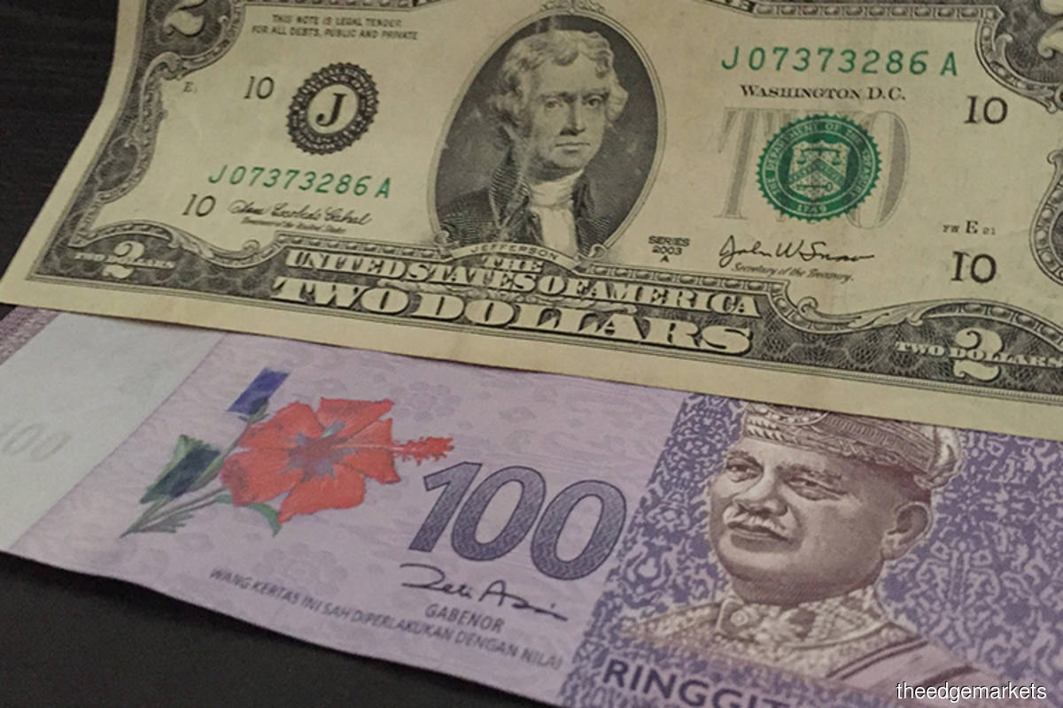 Ringgit ends higher versus US dollar