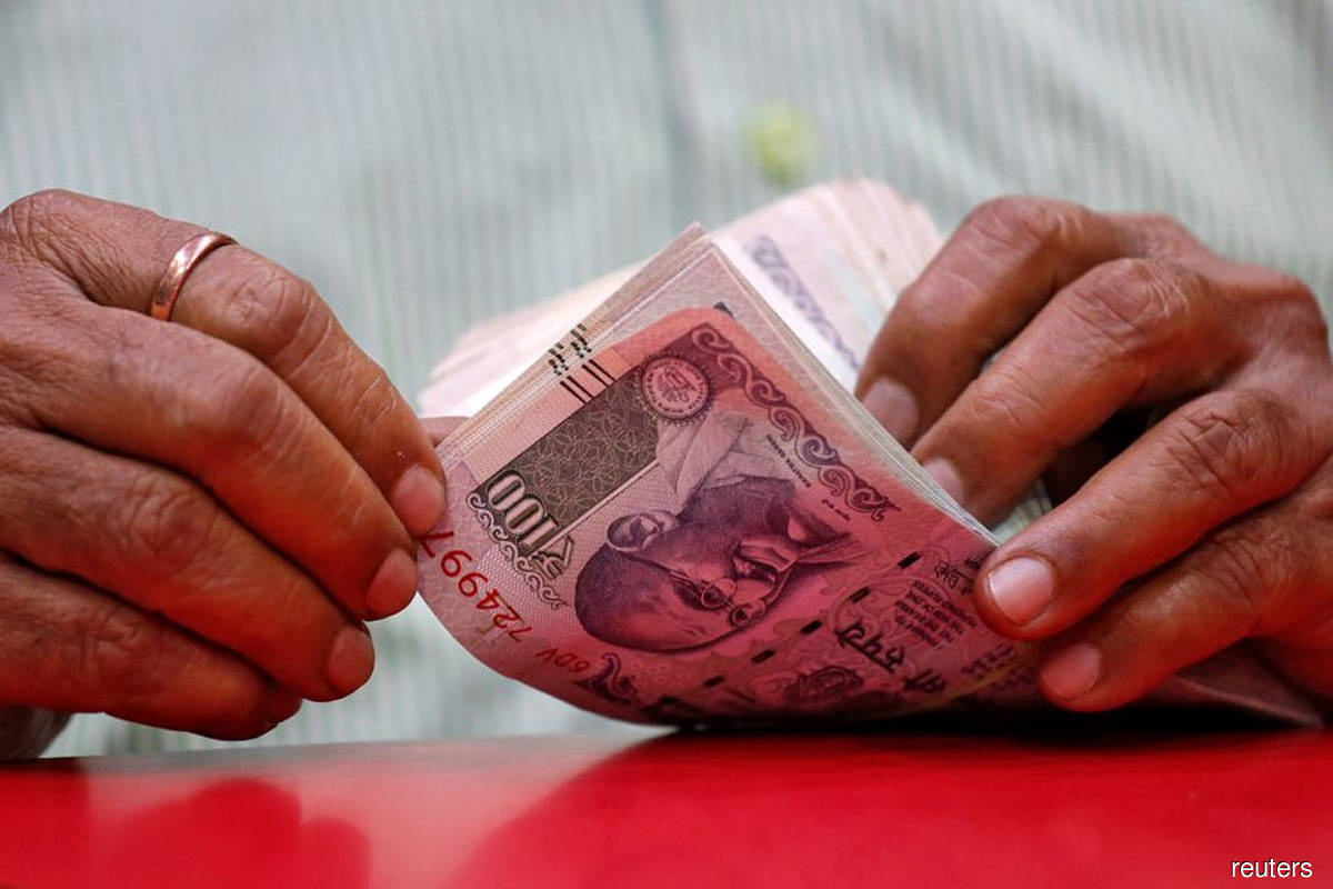 Rupee likely to open flat; focus on yuan, Fed meeting