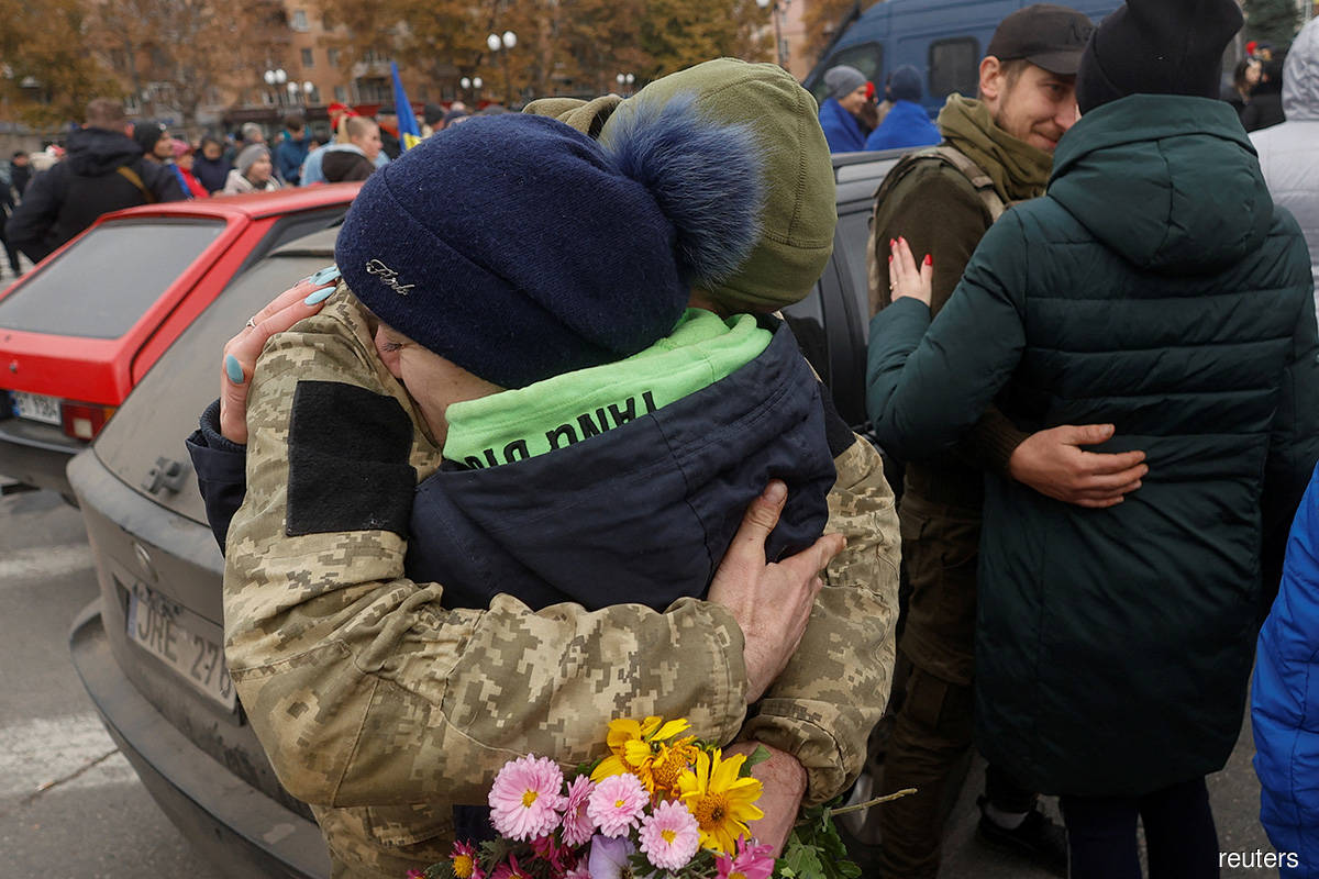 Zelenskiy accuses Russian troops of committing war crimes in Kherson
