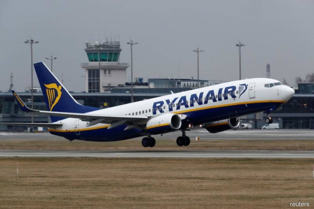 Ryanair posts first quarterly profit since Covid but annual loss looms