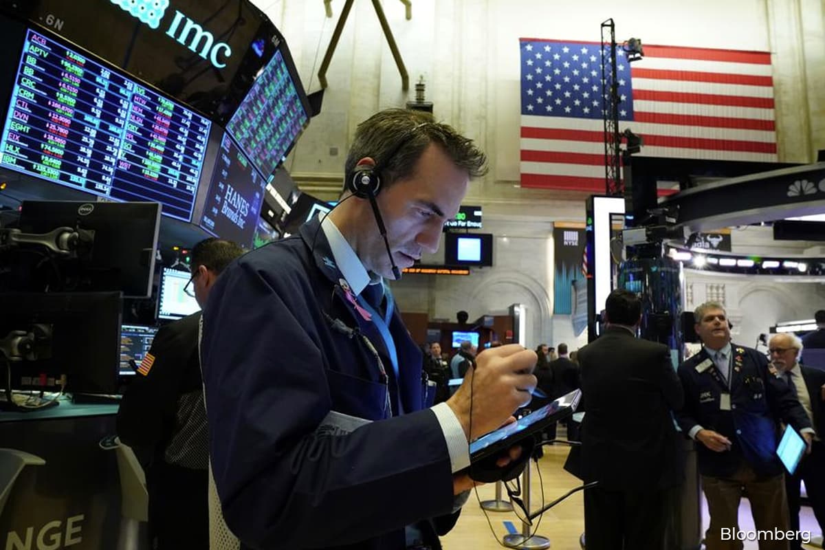 Dow hits milestone, S&P breaks record high on tech rally