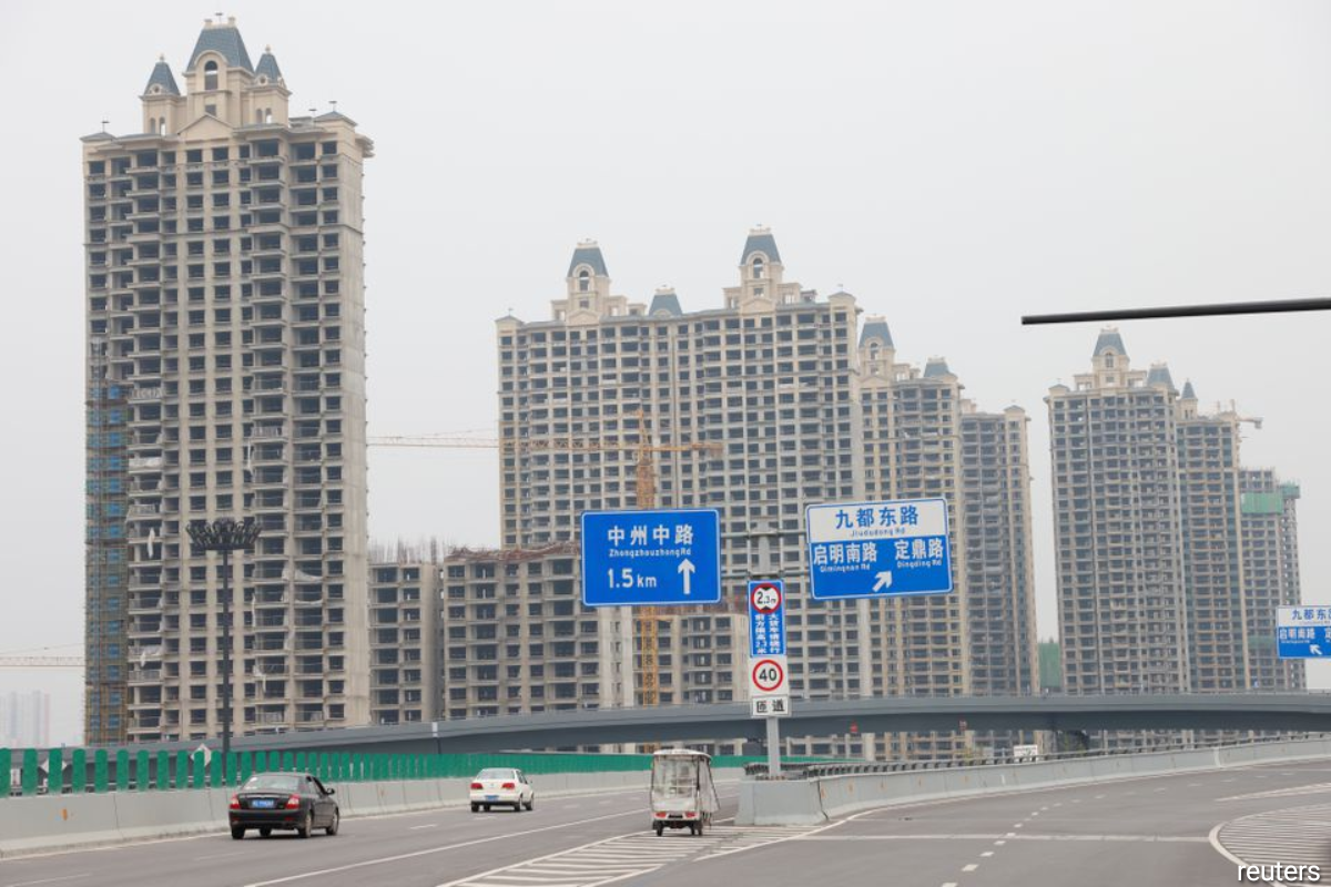 China's economy stumbles on power crunch, property woes