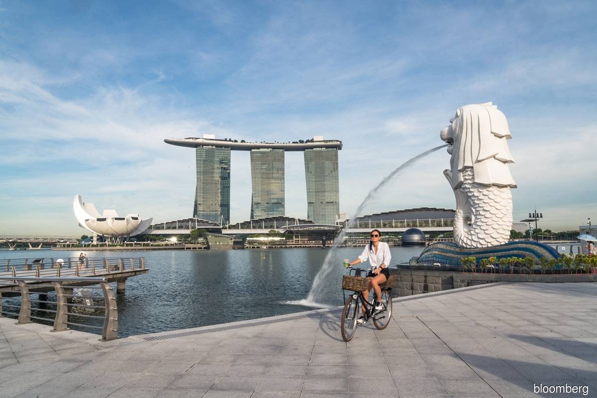 Singapore may possibly loosen up curbs for vaccinated travellers as WEF nears