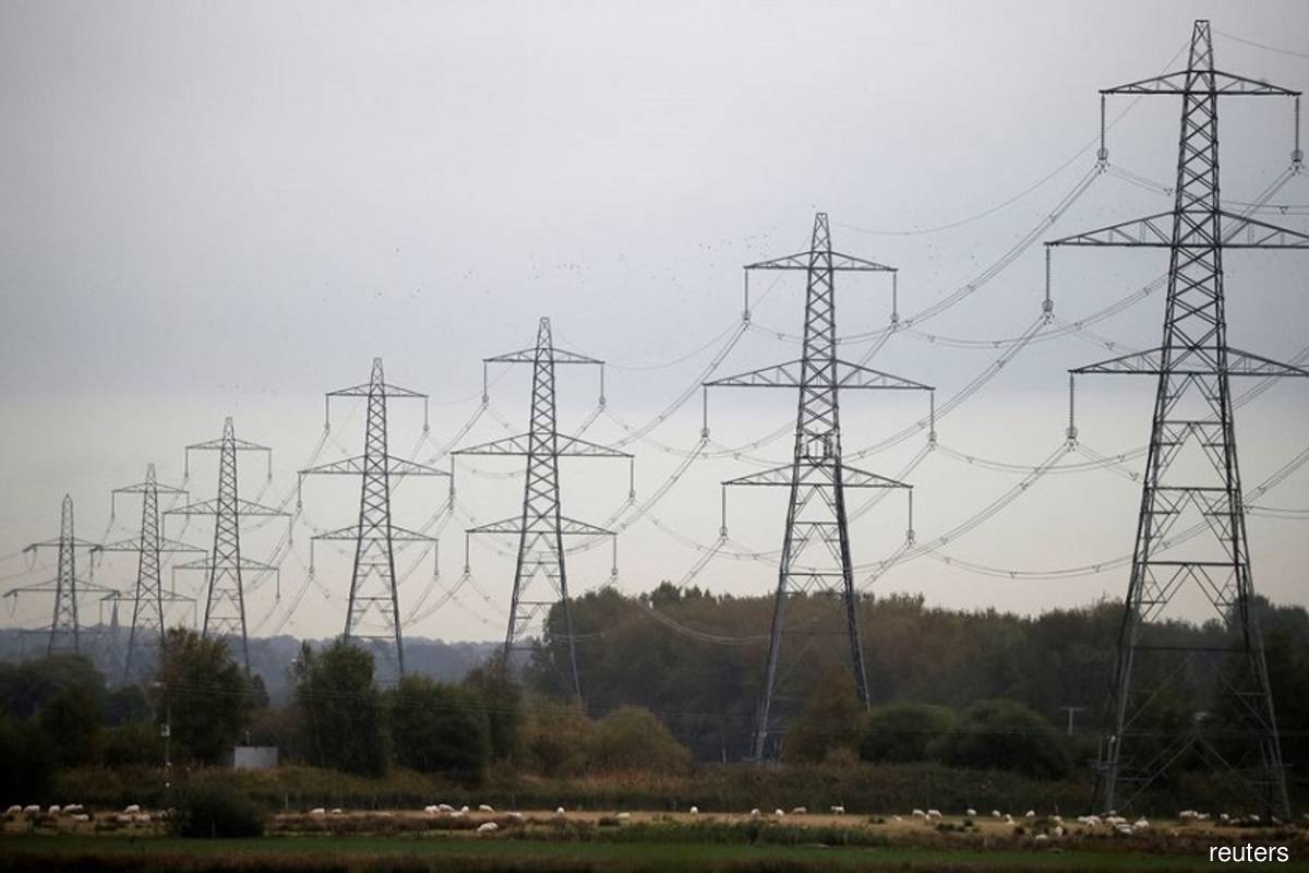 Britain to open US$44 bil support scheme for power firms on Oct 17 - The Edge Markets