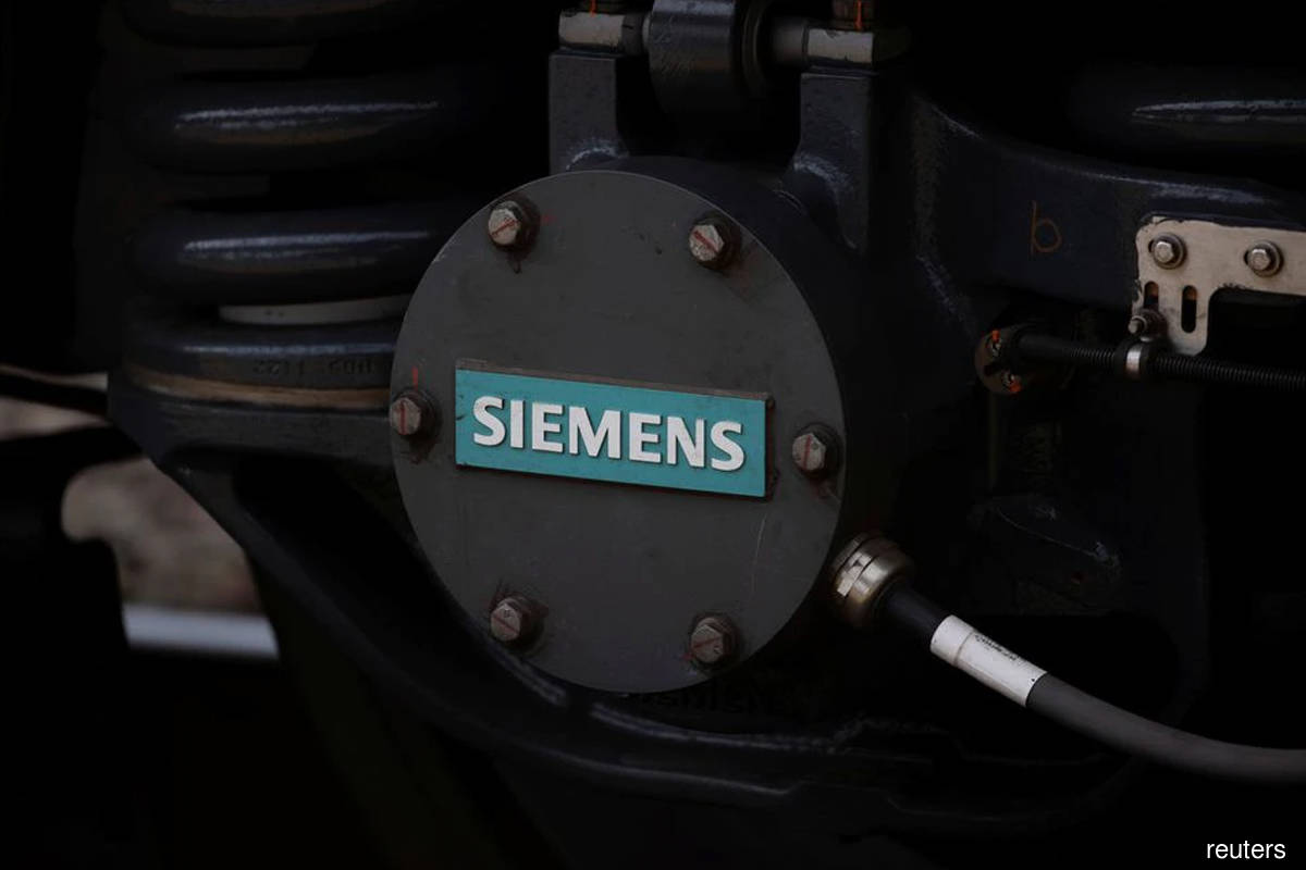 Siemens' writedown pushes company into first loss since 2010