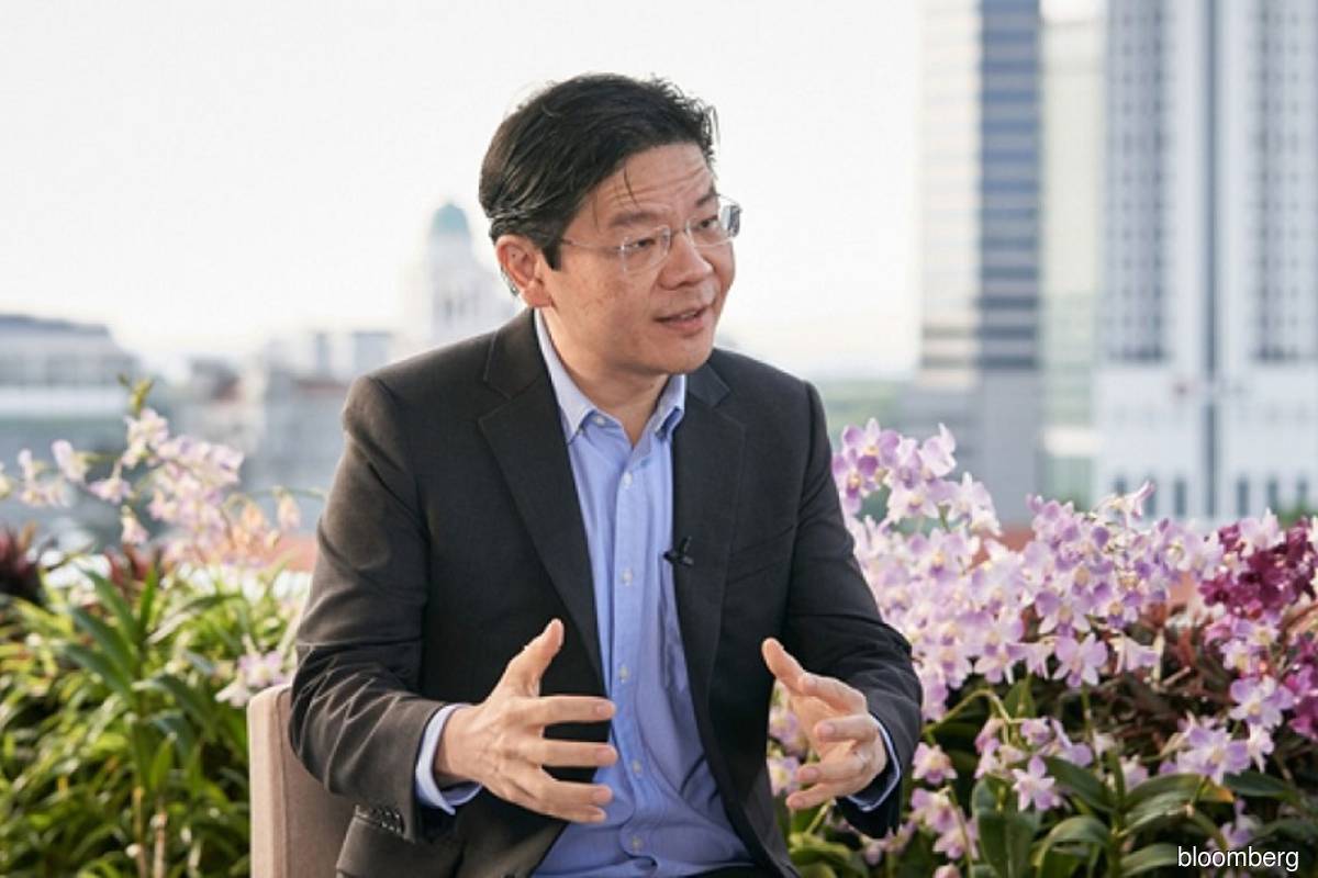 Covid-19 a 'dress rehearsal' for climate emergency, expect revised carbon tax rate at Budget 2022, says S'pore finance minister