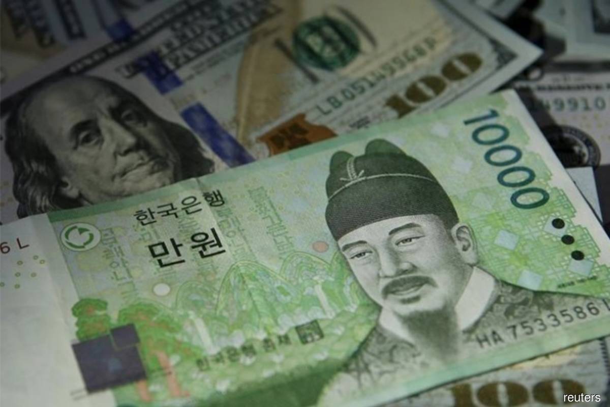 Asian stocks, currencies slide as Mideast tensions keep oil prices high