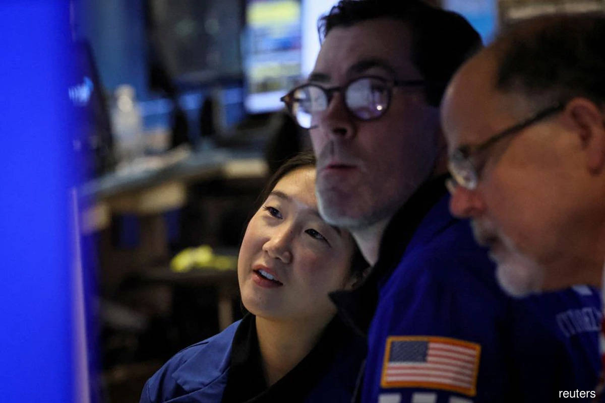 Tech, megacaps drag Wall St to lower close as big market week kicks off