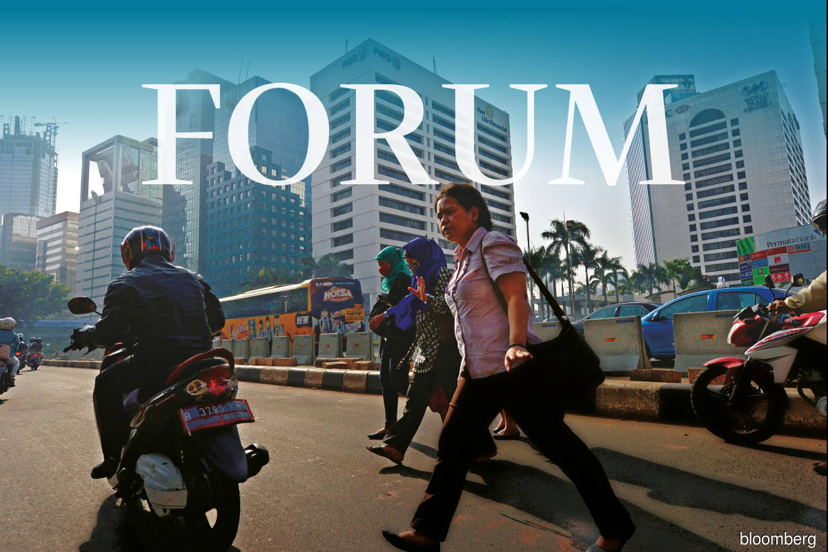 The business district in Jakarta, Indonesia … Southeast Asian economies need to find ways to insulate themselves against a more turbulent financial environment. (Photo by Bloomberg)
