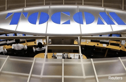 TOCOM pares gains; Thailand to sell from stockpile