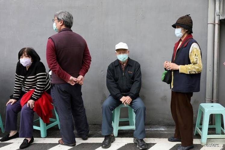 Taiwan coronavirus cases jump again, second death reported 