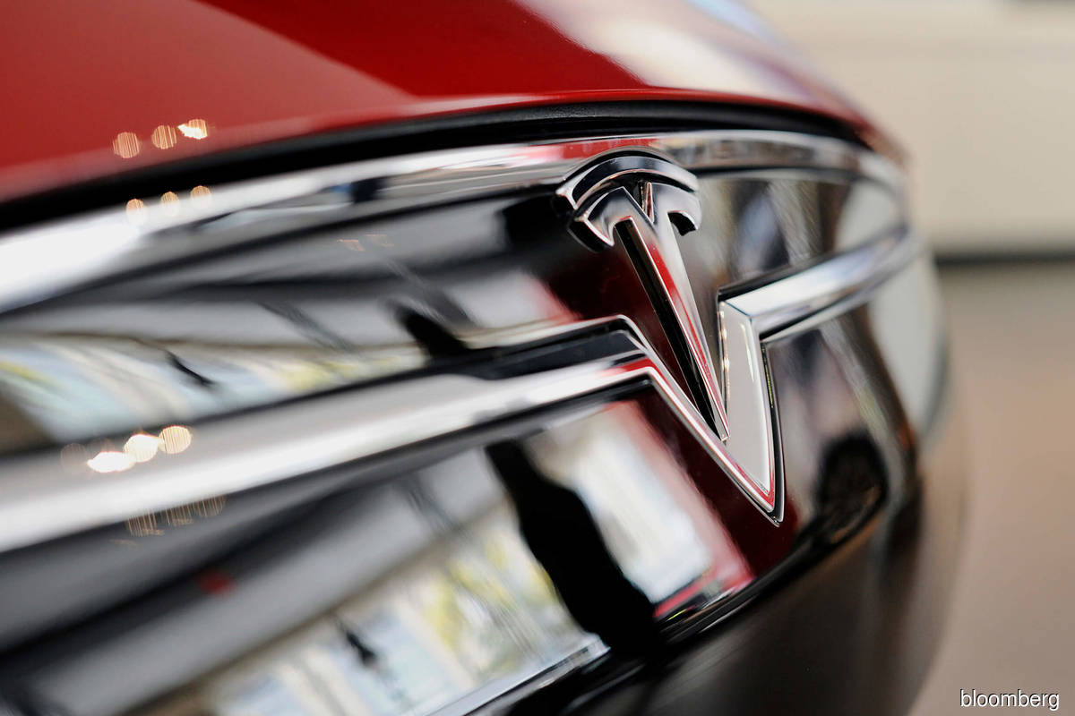 Tesla sets Aug 25 as trading day for three-for-one split shares