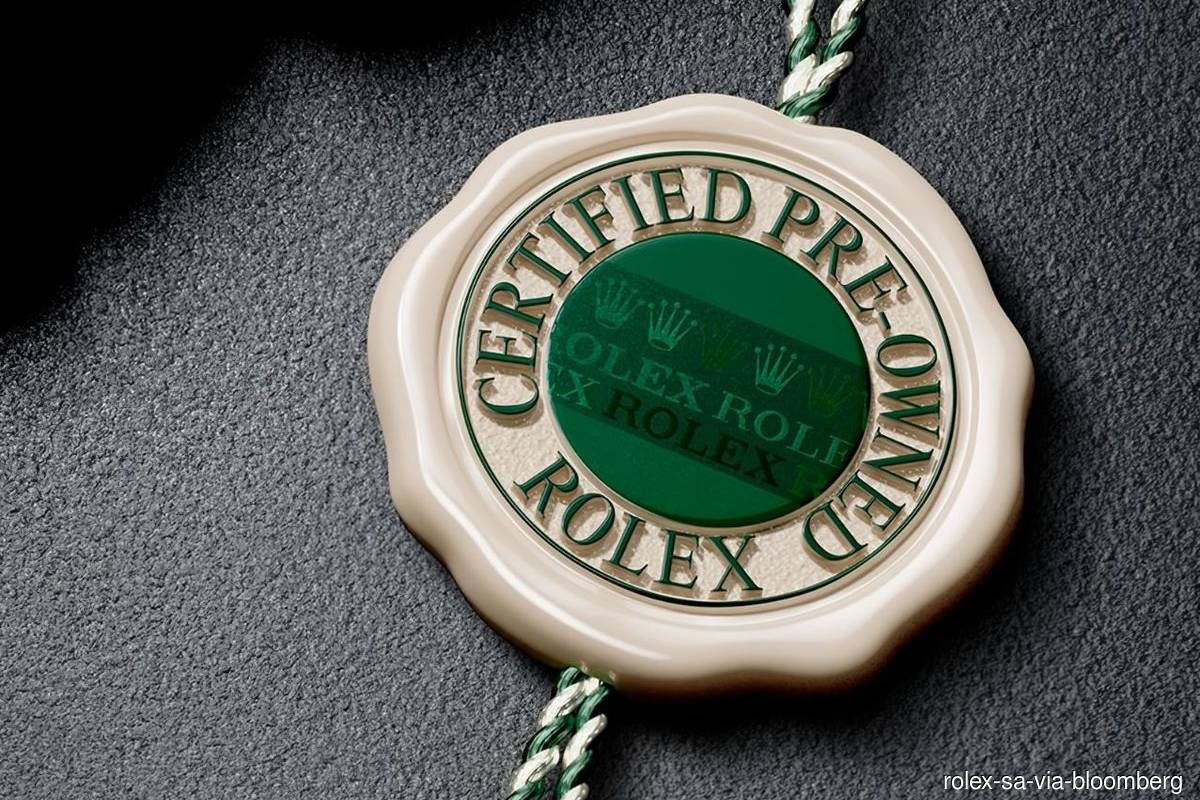 The Rolex Certified Pre-Owned seal (Photo credit: Rolex SA via Bloomberg)