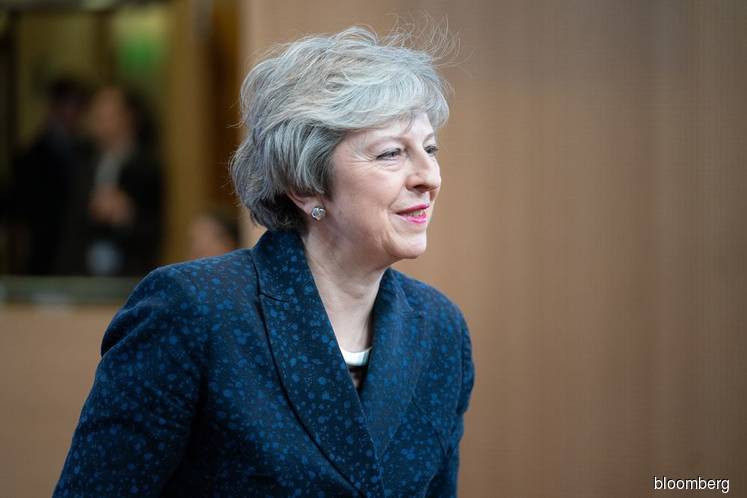 Theresa May begs Tory MPs to unite to deliver Brexit