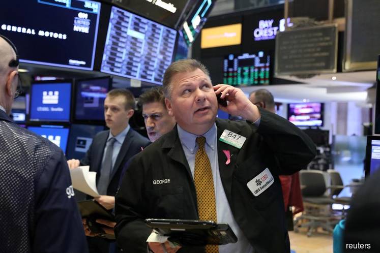 US stocks close higher; Boeing shares turn volatile